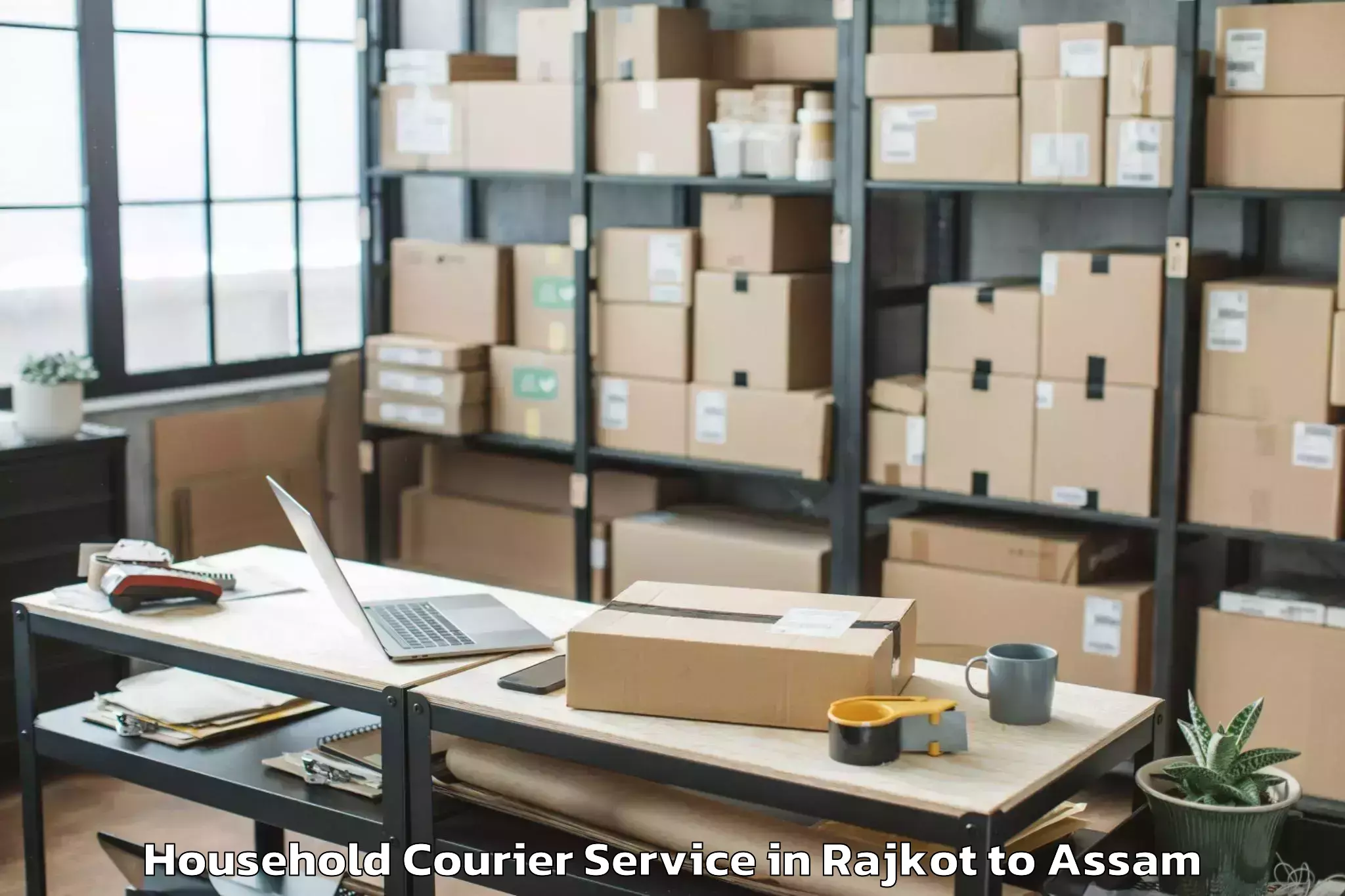 Book Rajkot to Rangia Household Courier Online